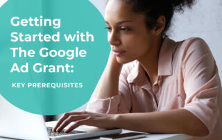 This is an image of a woman looking at her computer screen while applying for the Google Ad Grant program.